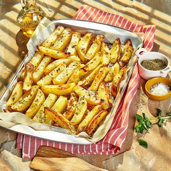 pommes de terre au four présentées par styliste culinaire pour editeurs